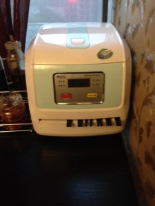 Sanitizing chopsticks (breakfast, Kunming)