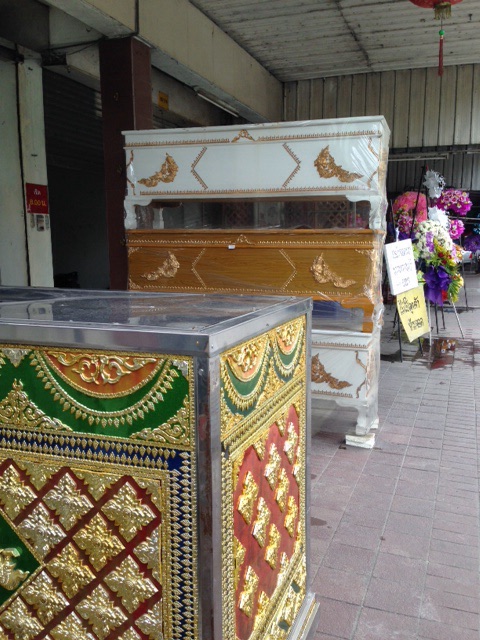 Coffins and flowers (wreaths)  Shop